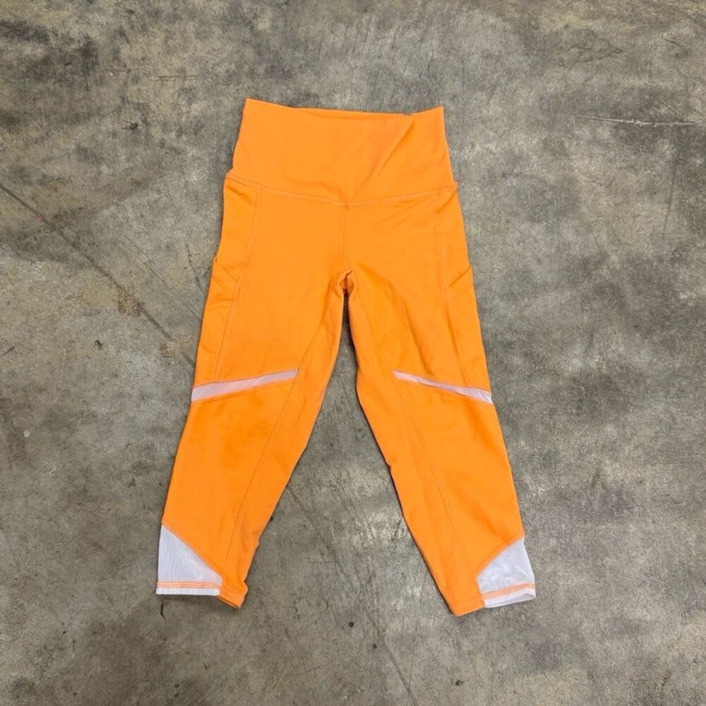 Alo yoga mesh detail orange athletic leggings